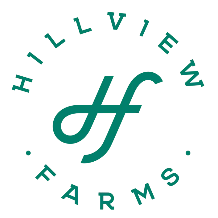 Logo of Hillview Farms featuring stylized lettering in green, circular design.