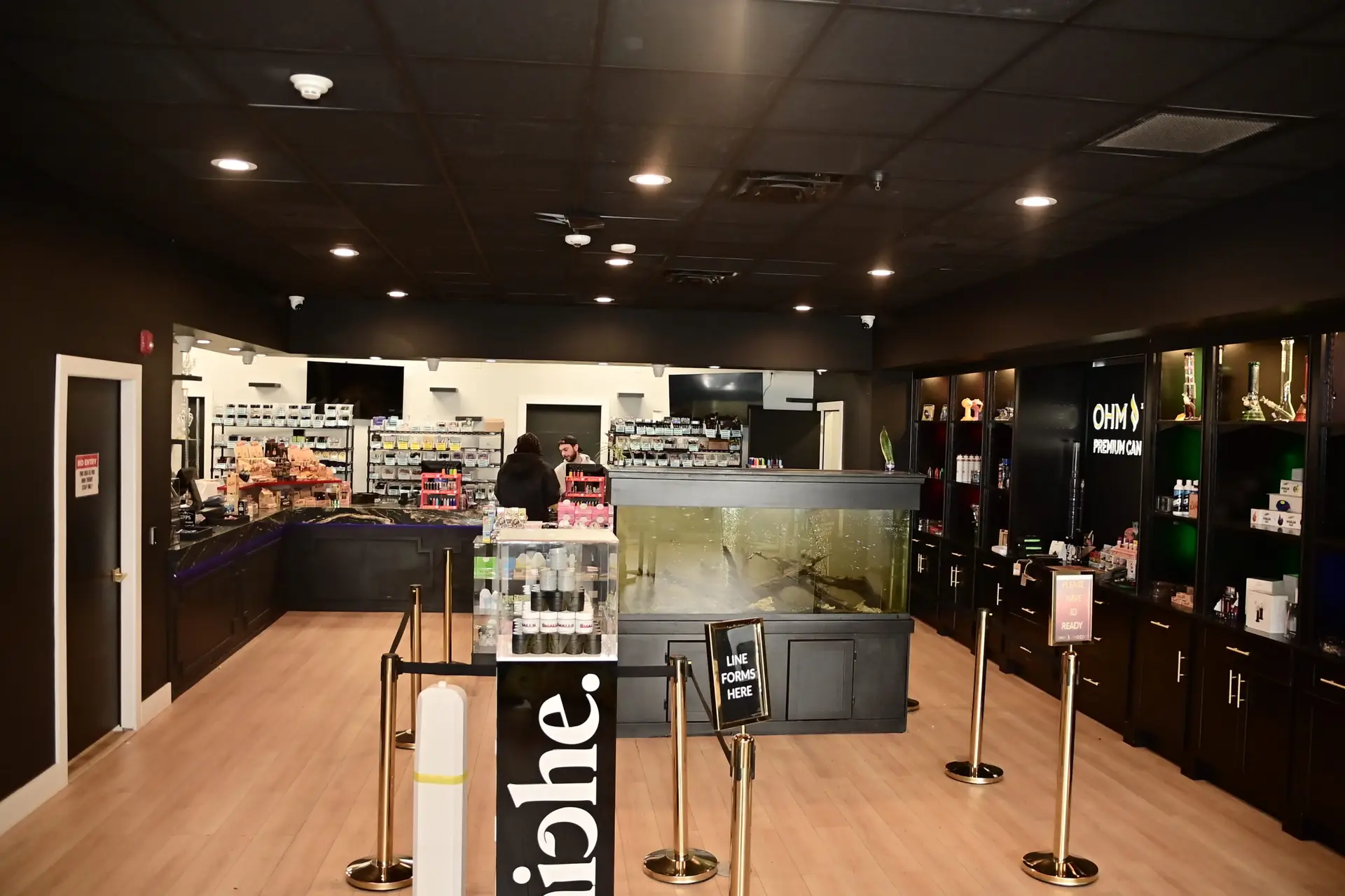 interior of Ohm Theory dispensary in Elmwood Park NJ near Fair Lawn and Paramus showing counter and queue area